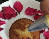 A picture of step 5 of Eggless mawa cup cake topping with shrikhand.