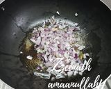 A picture of step 1 of Gobhi Tamater.