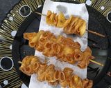 A picture of step 7 of Crunchy potato spirals.