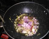 A picture of step 3 of Punjabi kadhi with green peas and coriander rice.