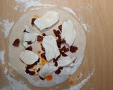 A picture of step 7 of Mozzarella and chorizo tear and share bread.