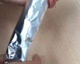 A picture of step 5 of Pin wheel bread sandwich.