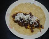 A picture of step 8 of Mexican beans enchiladas.