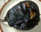 A picture of step 1 of Baigan Bhartha.