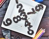 A picture of step 11 of Chocolate sprinkles numbers.