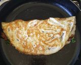 A picture of step 7 of Spinach Sausage Stuffed Omelette.