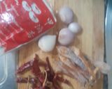 A picture of step 1 of Quick Sour Curry with Green Papaya and Omelet with Pak Wan Leaves (30-Minute Version).