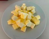 A picture of step 4 of Peach Dump Cake.