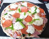 A picture of step 4 of My Over Loaded Pizza 😘.