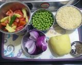 A picture of step 1 of Chatpata Matar Pulao.