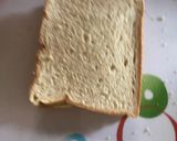 A picture of step 3 of Egg and sardine toasted bread.