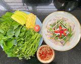 Hình bước làm 3 của món Mực Hấp Cuốn Bánh Tráng Rau Muống