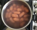 Une image de l'étape 2 de Salade composée aux légumes d été et saucisses cocktail.