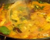 A picture of step 10 of Fish curry with coconut + turmeric.