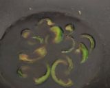 A picture of step 3 of Instant thupka soup with less oil in my style.