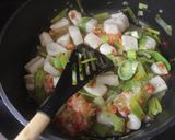 Foto del paso 4 de la receta: Pota con tomate