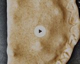 A picture of step 15 of Whole wheat Pizza Calzone.
