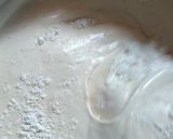 A picture of step 2 of Sponge cake filled with chunky blue berry jam.