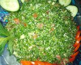 صورة لخطوة 3 من وصفة كوسا محشي وورق عنب
