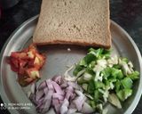 A picture of step 2 of Square shaped Bread with veggies and Cheese.