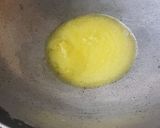 A picture of step 1 of Gajar Ka Halwa.