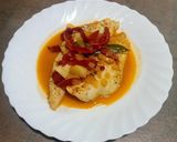 Foto del paso 4 de la receta: Filetes de merluza con pimientos de piquillo y ajos confitados