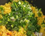 A picture of step 13 of Nigerian fried rice.