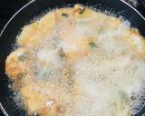A picture of step 1 of Golden yam fried in egg with sauce🍽.