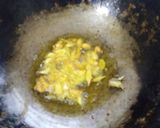 A picture of step 2 of Lasooni bhindi.