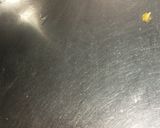 A picture of step 5 of Besan with dry fruits.