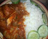 A picture of step 8 of White Rice with catfish pepper soup and cucumber.