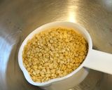 A picture of step 1 of Thinai Pongal: (Foxtail Millets).