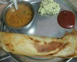 A picture of step 17 of Sambhar dosa with coconut chtni and sauce.