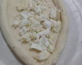 A picture of step 3 of Khachapuri with four cheese.