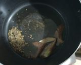 A picture of step 2 of Masoor daal r Khichdi/ Rice and red lentil porridge.