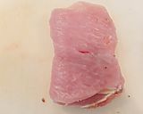 A picture of step 4 of Chicken Cordon Bleu.