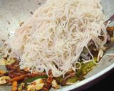 A picture of step 4 of Veg Noddles with dry manchurian balls.