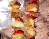 A picture of step 4 of Healthy chicken skewers served with a salad.