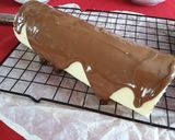 A picture of step 6 of Kinder Explosion Swiss Roll.
