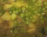 A picture of step 3 of Aloo Matar.