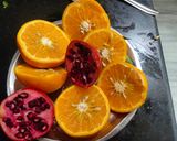 A picture of step 1 of Orange pomegranate juice.