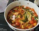 A picture of step 2 of Salmon in Onion and Tomato Sauce.