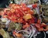 A picture of step 18 of Sinasir with potato vegetable sauce.
