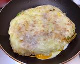 A picture of step 7 of Japanese Hiroshima Okonomiyaki Pancake.