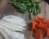 A picture of step 1 of Green and pink sauce backed pasta.