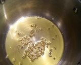 Foto del passaggio 2 della ricetta Spaghetti al nero di seppia con seppia tostata