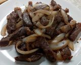 A picture of step 6 of Pan Fry Beef Steak and Onion.