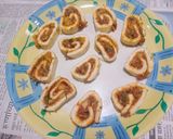 A picture of step 7 of Steamed stuff suji rolls.