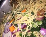 A picture of step 2 of Spaghetti jollof.