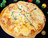 A picture of step 8 of Cheese Burst Veggies And Chicken Pizza From Scratch.